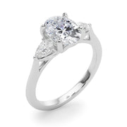 Elegant three stone Oval with Pear Accents