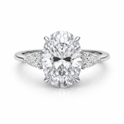 Elegant three stone Oval with Pear Accents