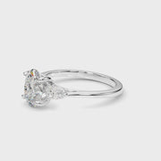 Elegant three stone Oval with Pear Accents